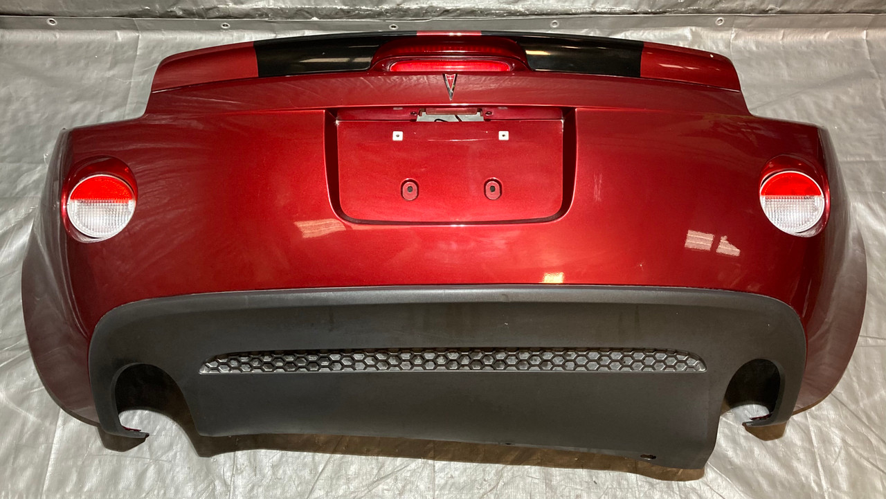 2007-2009 Pontiac Solstice GXP Rear Bumper Cover w/ Valance / Spoiler / Wicked (ruby red metallic) PS070 2007-2009 Pontiac Solstice GXP Rear Bumper Cover w/ Valance / Spoiler / Wicked (ruby red metallic) PS070