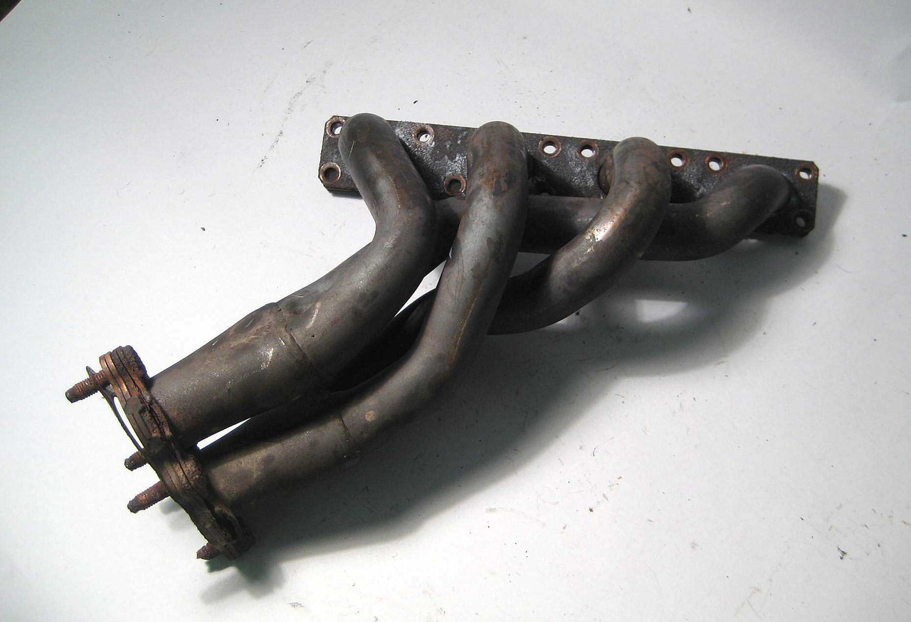 BMW M42 M44 4-Cyl Exhaust Manifold 1990-1996 E30 E36 Z3 1.9L 318i 318is OEM USED BMW M42 M44 4-Cyl Exhaust Manifold 1990-1996 E30 E36 Z3 1.9L 318i 318is OEM USED